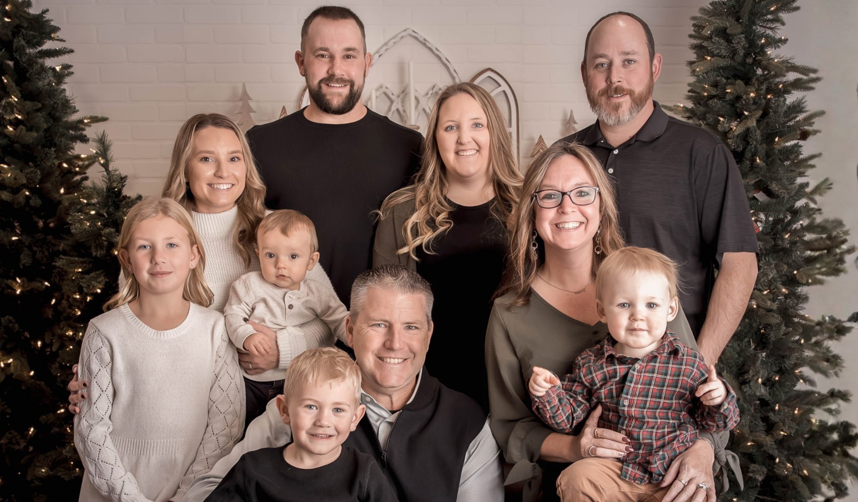 Judy Harding-Staelens taking a photo with her family